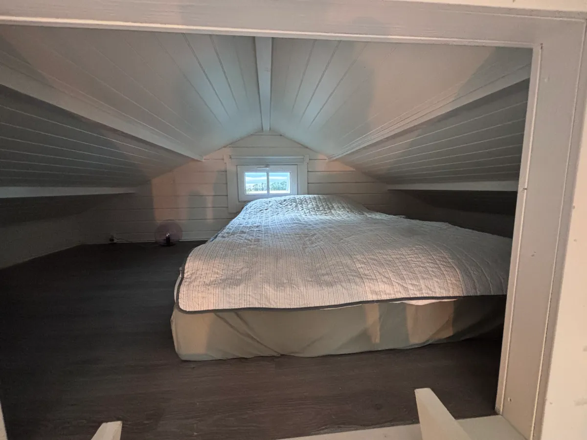 Cozy double bed in the sleeping loft